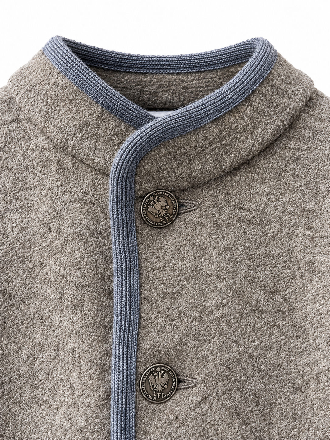 Close-up of a textured gray wool coat with a ribbed blue-gray collar and front trim, featuring two round dark metal buttons.